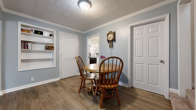 12 W Park Dr, Shelby, OH 44875 - dining area with dark wood-style floors, built in features, ornamental molding, and baseboards