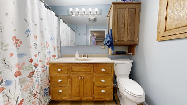 12 W Park Dr, Shelby, OH 44875 - full bath with toilet, vanity, and a shower with shower curtain