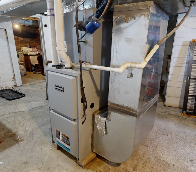 12 W Park Dr, Shelby, OH 44875 - utility room with heating unit