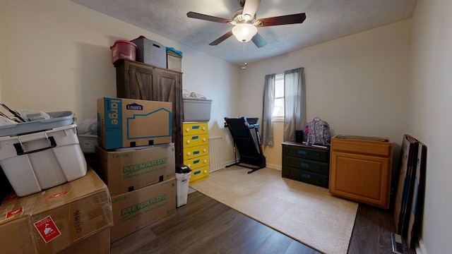 12 W Park Dr, Shelby, OH 44875 - home office featuring ceiling fan, wood finished floors, and baseboards