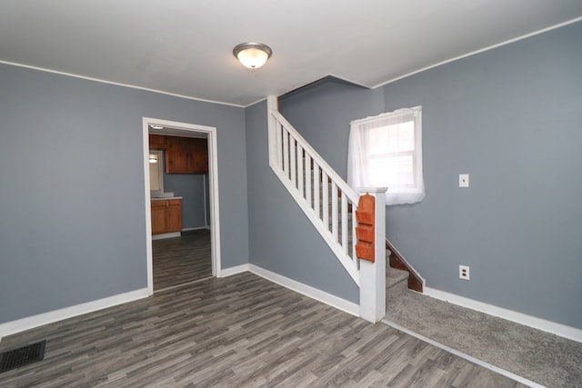 interior space with dark hardwood / wood-style floors