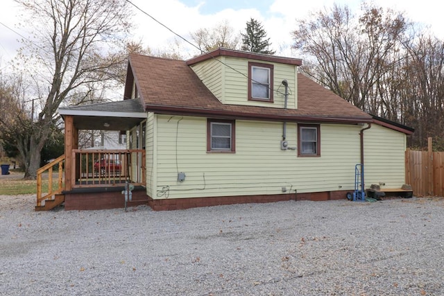 view of home's exterior with covered porch