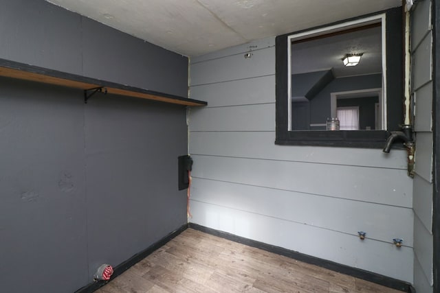 walk in closet featuring hardwood / wood-style flooring