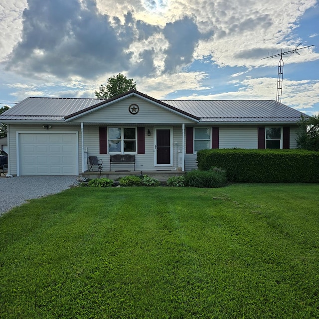 1112 Horning Rd, Crestline, OH 44827 - single story home with an attached garage, gravel driveway, a front lawn, metal roof, and covered porch