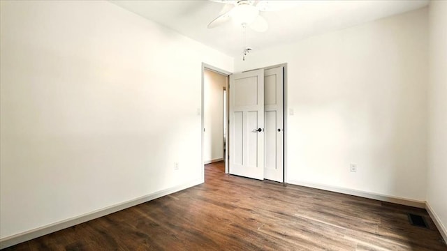 3306 Township Rd Unit 221, Marengo, OH 43334 - unfurnished bedroom with dark wood-style floors and a ceiling fan