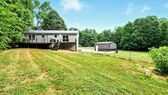 3306 Township Rd Unit 221, Marengo, OH 43334 - back of property with a deck, a fenced backyard, and stairway