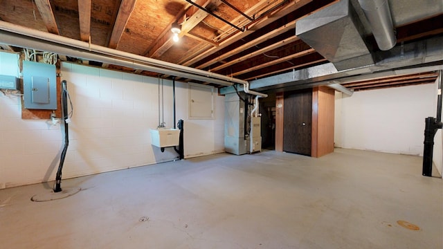 621 Heidi Ln, Mansfield, OH 44904 - unfinished below grade area with electric panel and heating unit