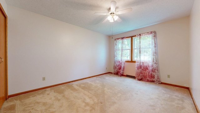 621 Heidi Ln, Mansfield, OH 44904 - carpeted spare room with ceiling fan and a textured ceiling