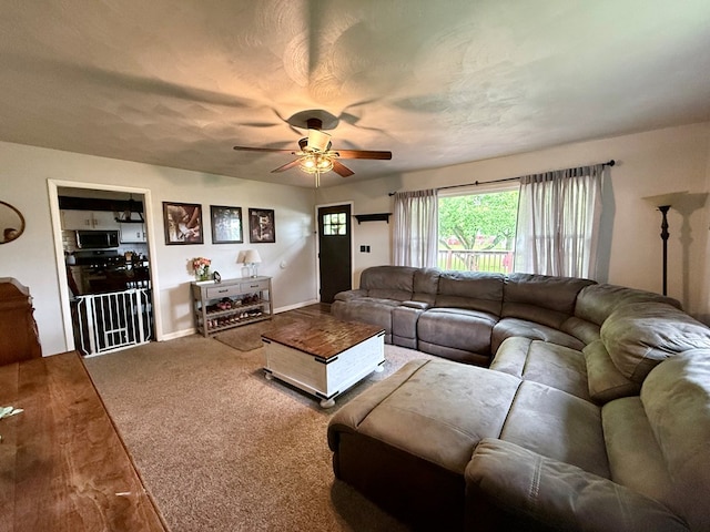 108 Melcher Blvd, Bucyrus, OH 44820 - living room with a ceiling fan and carpet floors