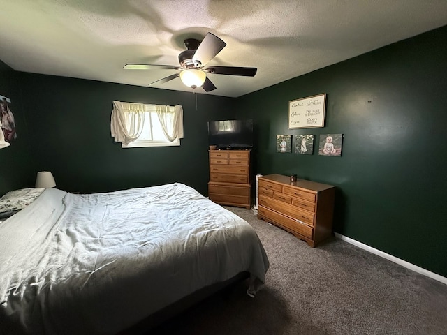 108 Melcher Blvd, Bucyrus, OH 44820 - carpeted bedroom with ceiling fan and baseboards