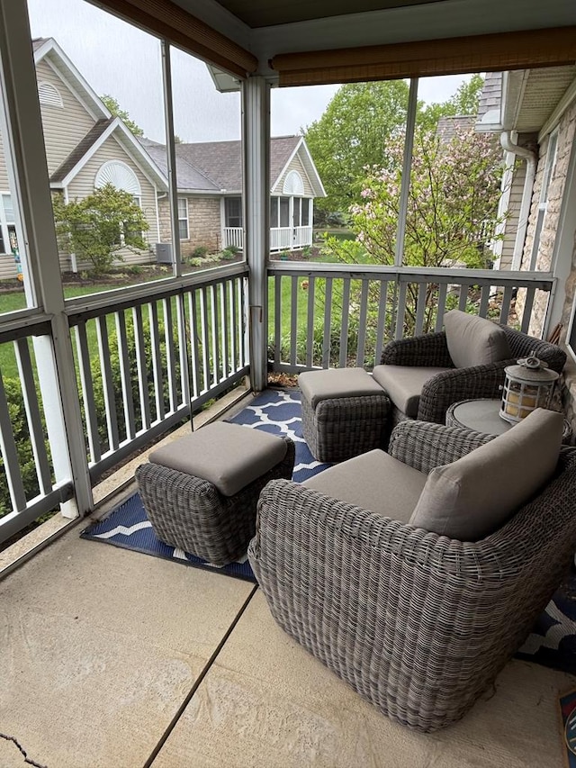 sunroom / solarium featuring plenty of natural light
