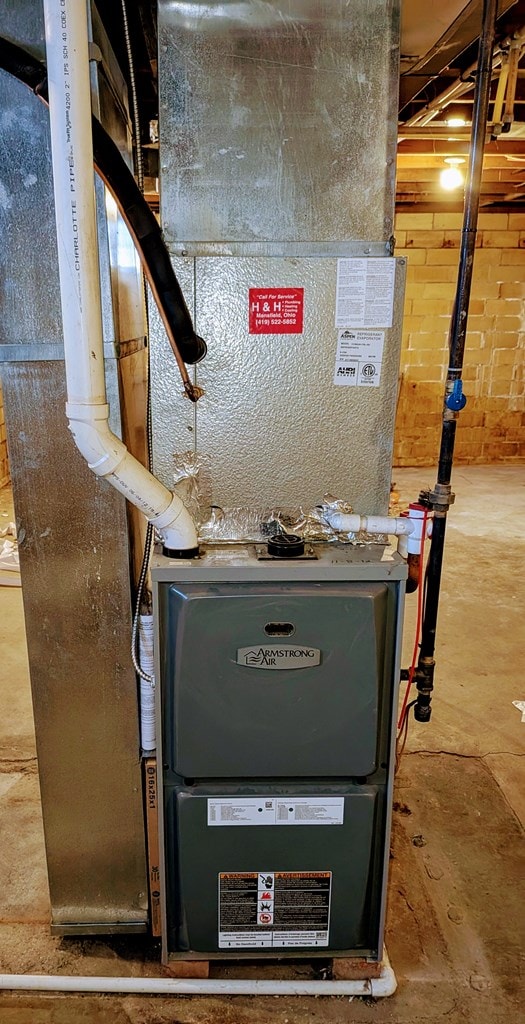 utility room with heating unit