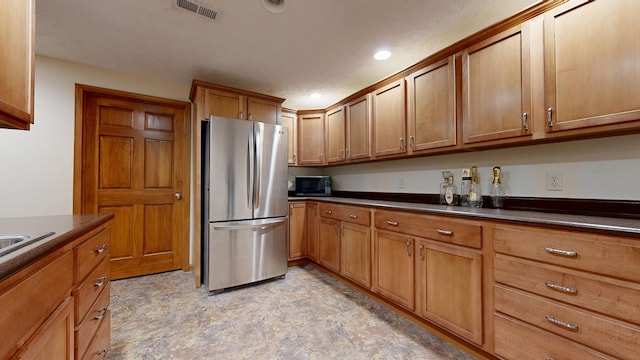 kitchen with stainless steel refrigerator