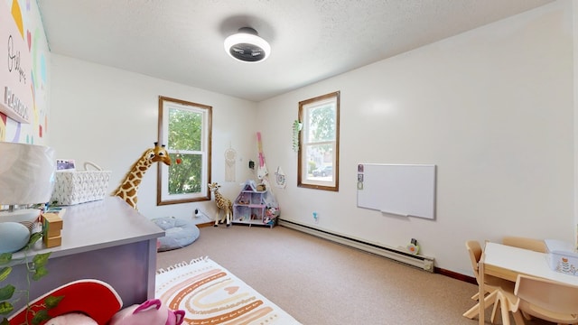 41 Auburn Ave, Shelby, OH 44875 - recreation room featuring a baseboard heating unit and carpet floors