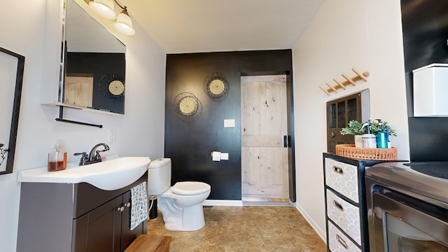 41 Auburn Ave, Shelby, OH 44875 - full bathroom with vanity and washer / dryer