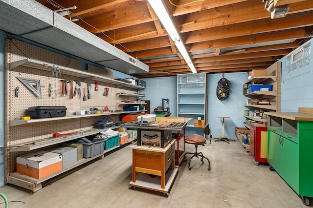 basement featuring a workshop area