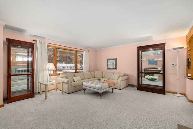 living room with carpet flooring and ornamental molding