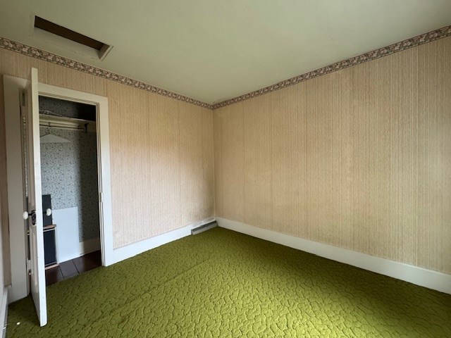 3649 Nazor Rd, Crestline, OH 44827 - unfurnished bedroom with carpet floors