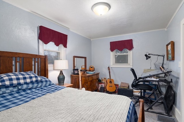 bedroom featuring ornamental molding