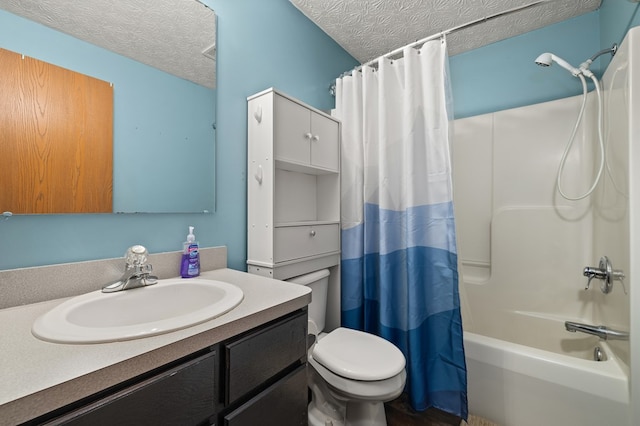 full bathroom featuring vanity, shower / bath combination with curtain, a textured ceiling, and toilet