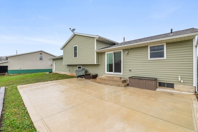 back of property featuring a patio