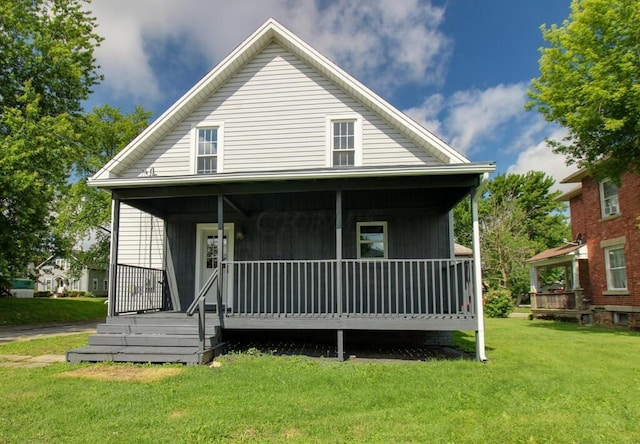 view of front of home with a front lawn and covered porch