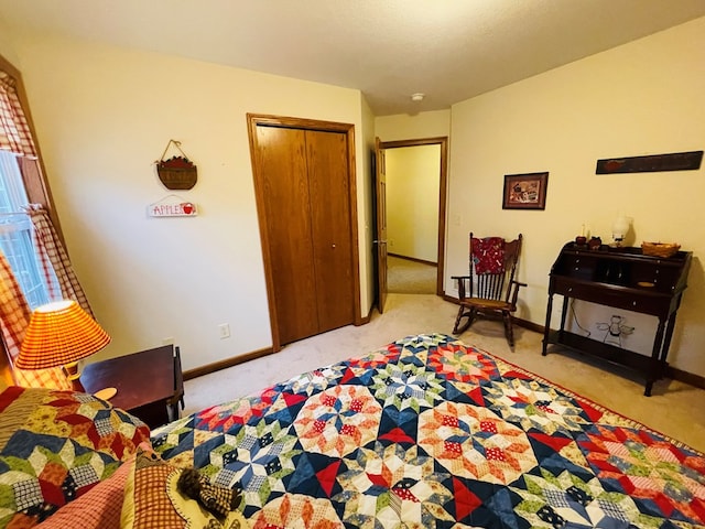 carpeted bedroom with a closet