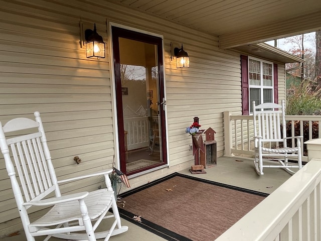 doorway to property with a porch