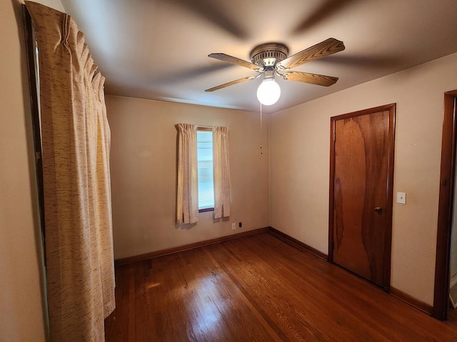 unfurnished bedroom with hardwood / wood-style flooring and ceiling fan