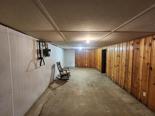 basement with wood walls