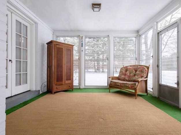 sunroom / solarium with a wealth of natural light