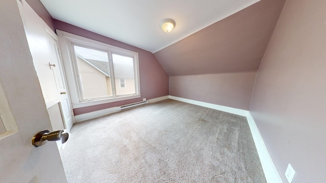 additional living space with lofted ceiling and light colored carpet