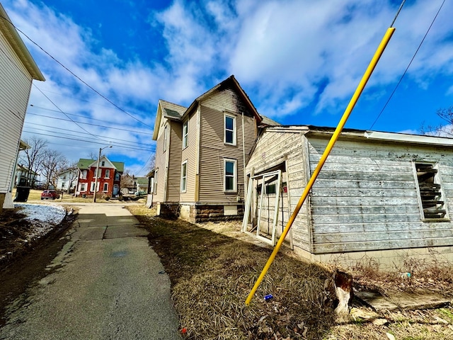 view of home's exterior with a garage