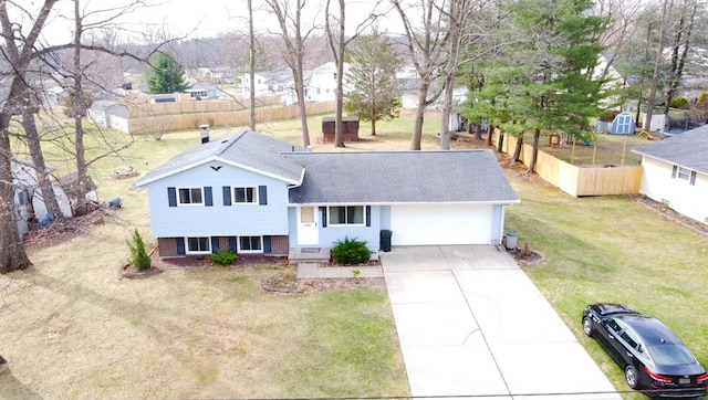 1690 Evergreen Ave W, Mansfield, OH 44905 - view of yard featuring a storage shed, fence, and an outdoor structure