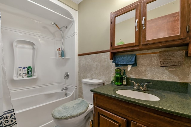 1690 Evergreen Ave W, Mansfield, OH 44905 - half bath featuring wooden walls, toilet, ceiling fan, and vanity