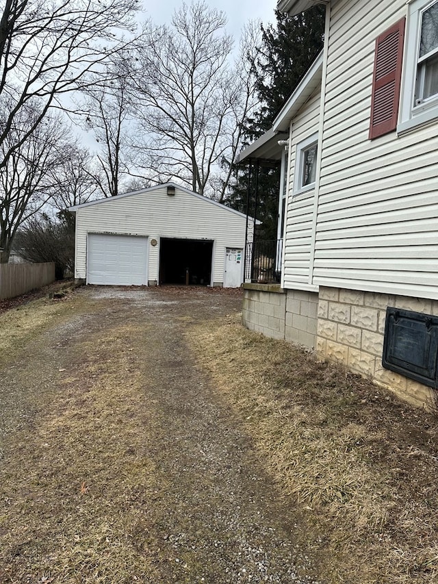 detached garage with fence