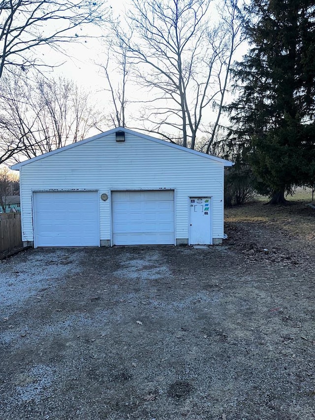 detached garage with fence