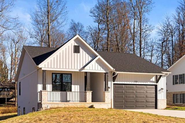 modern farmhouse style home with a garage, covered porch, and a front yard