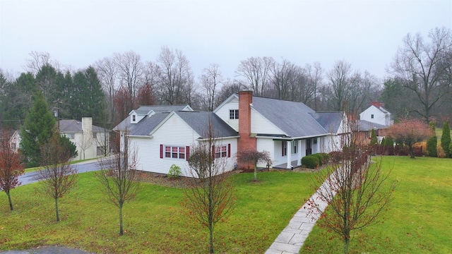 view of property exterior with a lawn