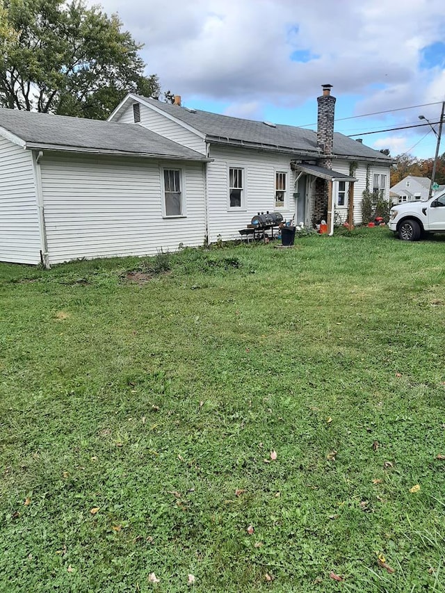 exterior space featuring a yard