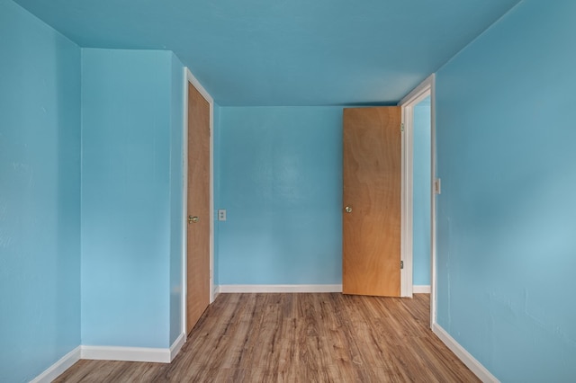 933 Fairfax Ave, Mansfield, OH 44906 - spare room with wood finished floors and baseboards