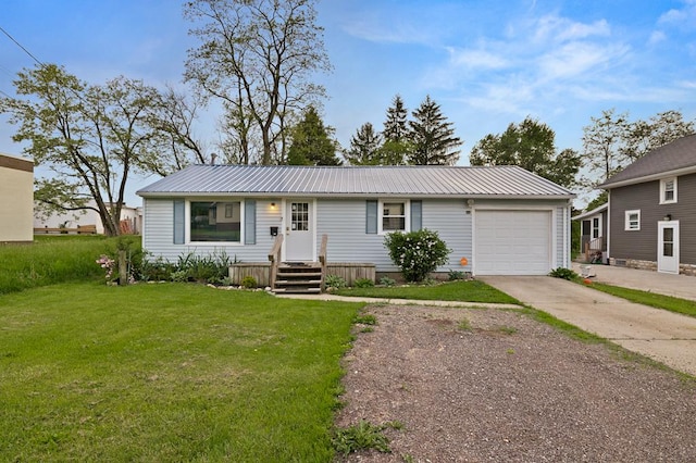 933 Fairfax Ave, Mansfield, OH 44906 - view of front of house featuring driveway, an attached garage, a front lawn, and metal roof
