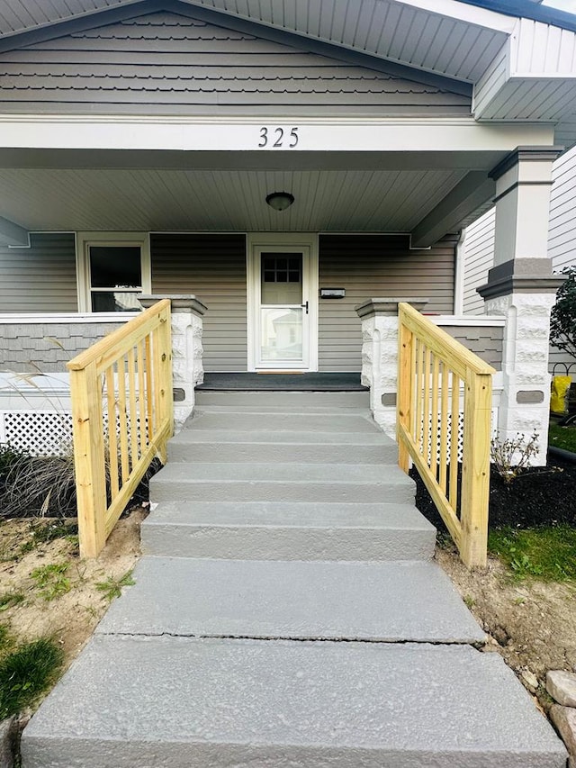 property entrance with a porch