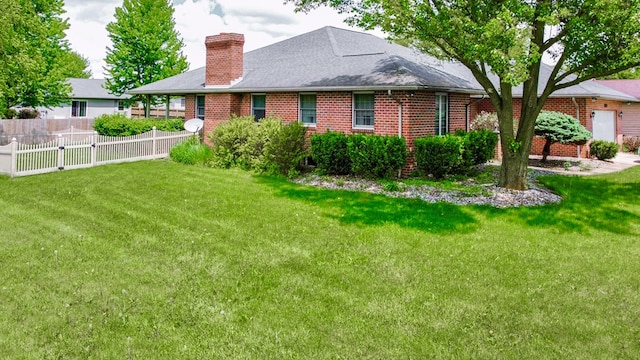 1320 Oakridge Rd, Bucyrus, OH 44820 - back of house with a chimney, brick siding, and a shingled roof