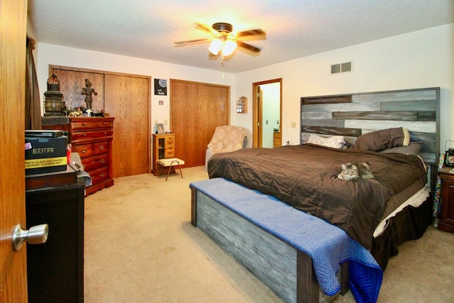 1320 Oakridge Rd, Bucyrus, OH 44820 - bedroom with carpet, two closets, and ceiling fan