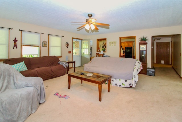 1320 Oakridge Rd, Bucyrus, OH 44820 - living area featuring plenty of natural light, light carpet, and ceiling fan