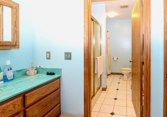 1320 Oakridge Rd, Bucyrus, OH 44820 - bathroom featuring a stall shower, vanity, tile patterned floors, and toilet