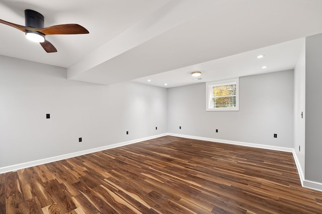 interior space with ceiling fan and dark wood-type flooring