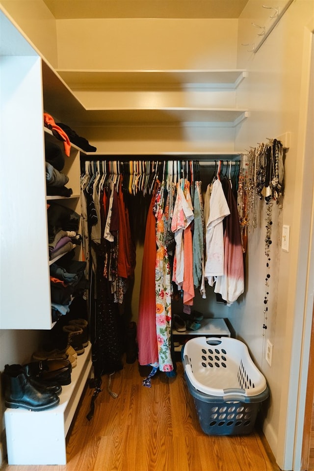 spacious closet featuring wood finished floors