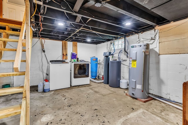 1508 W Hanley Rd, Mansfield, OH 44904 - unfinished basement featuring water heater, washing machine and clothes dryer, and a water softener